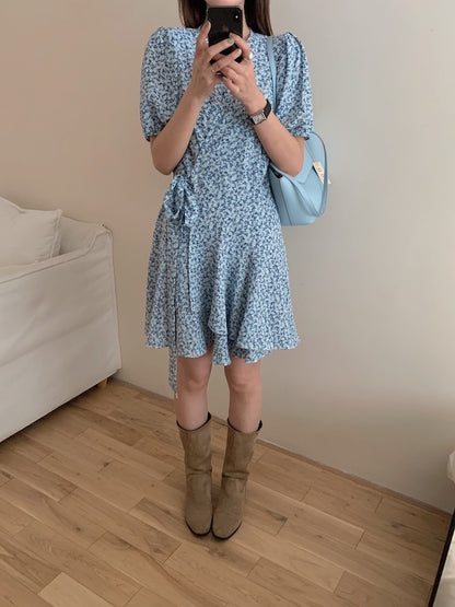 A one-piece tie-front floral dress