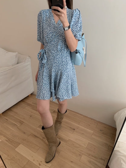 A one-piece tie-front floral dress