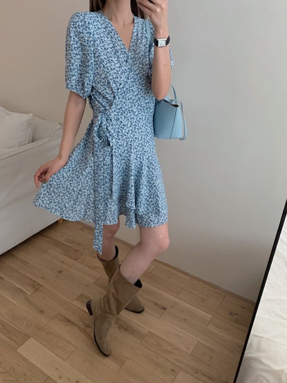 A one-piece tie-front floral dress