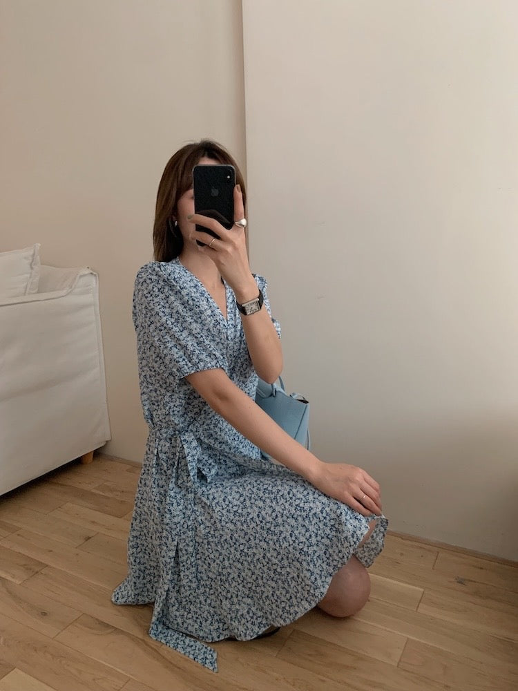 A one-piece tie-front floral dress