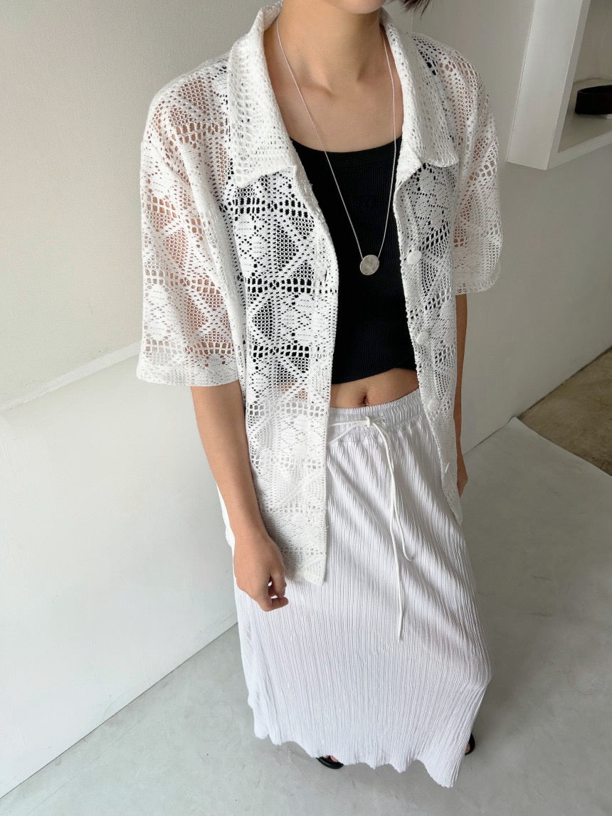 レース編みのブロークントップス