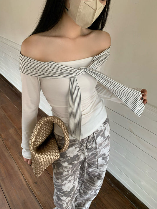 ネイビーカラーのストライプ切り替え長袖Tシャツ