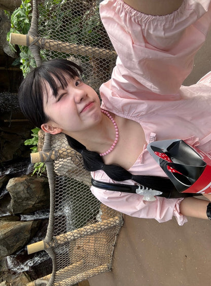 デザイン感のあるレースアップ長袖シャツ