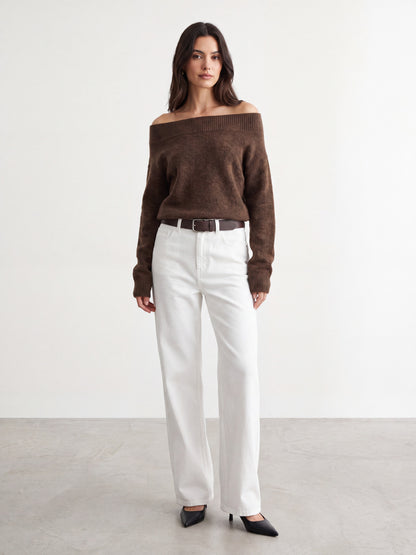 Model wearing white straight jeans