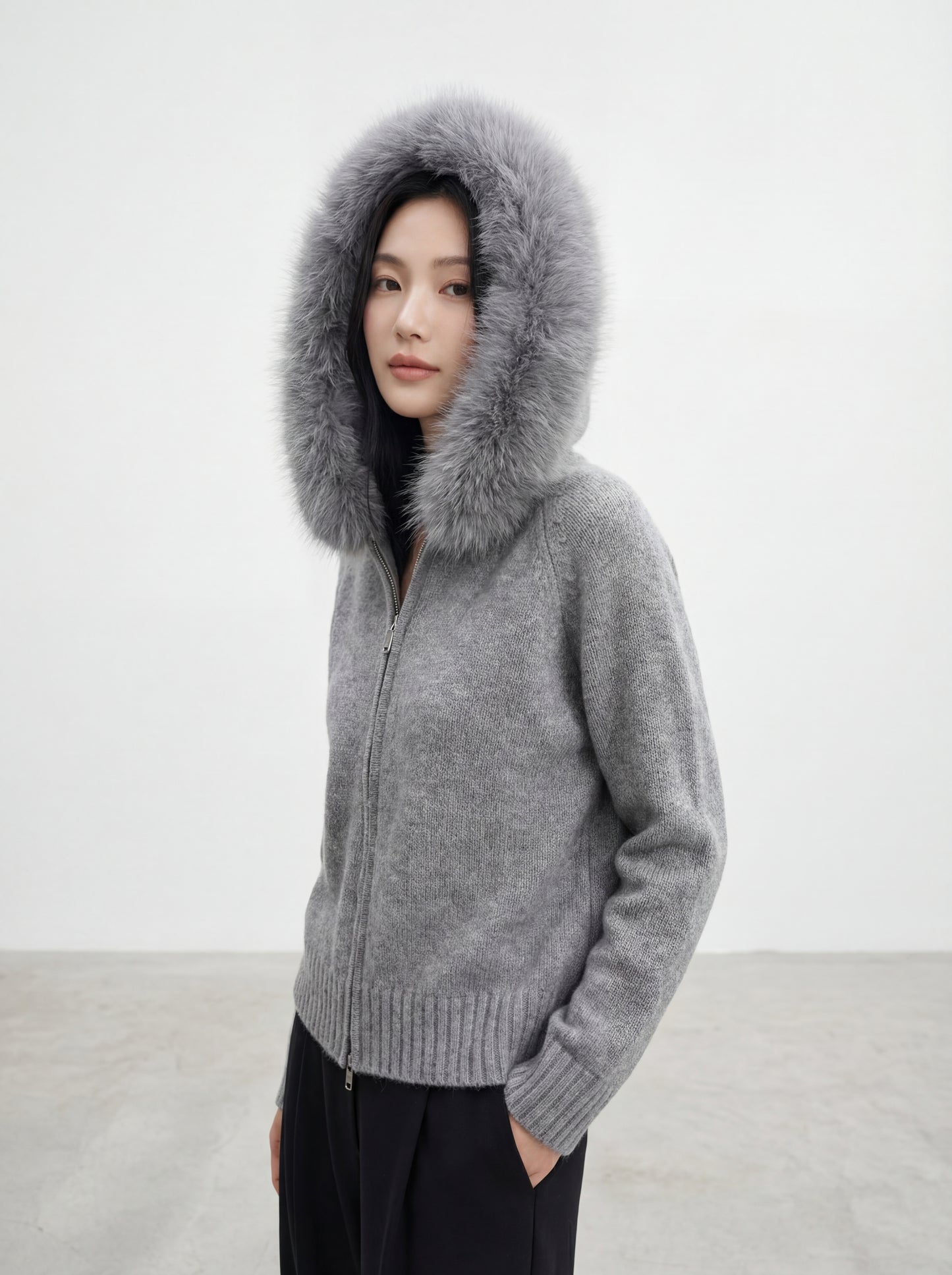 Knit Sweater with Large Fur-Trimmed Hood