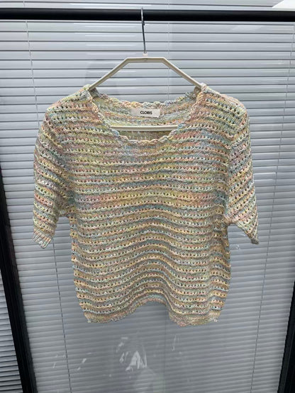 Pastel rainbow open-knit short-sleeve top on a hanger