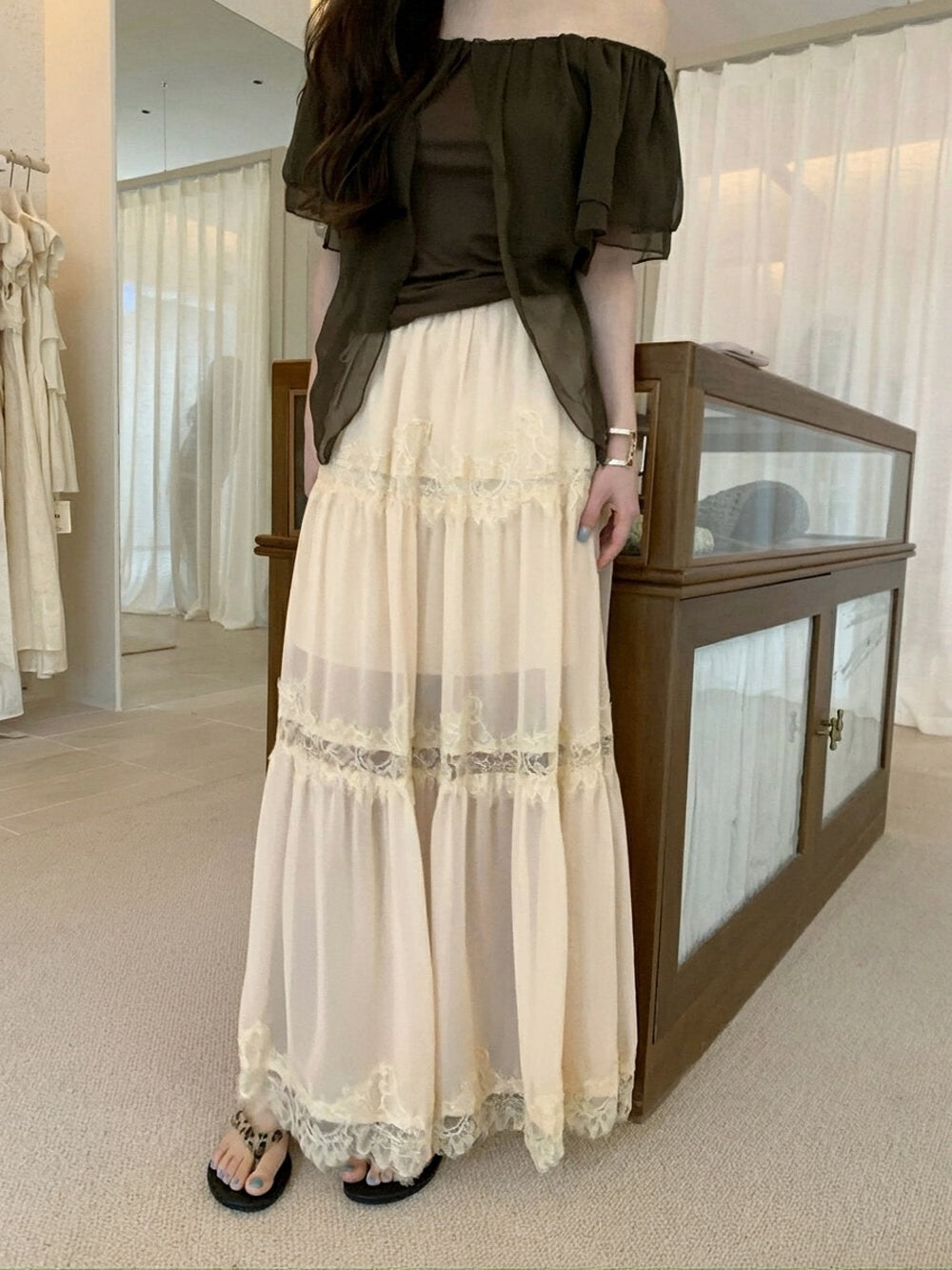 Close-up of apricot heavy lace spliced midi skirt