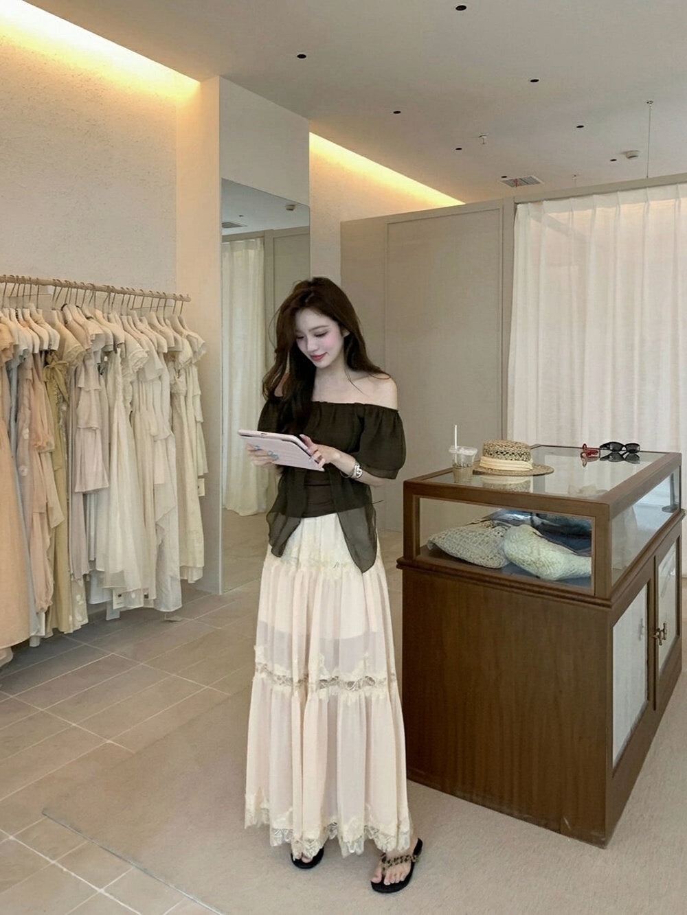 Model wearing apricot heavy lace spliced midi skirt