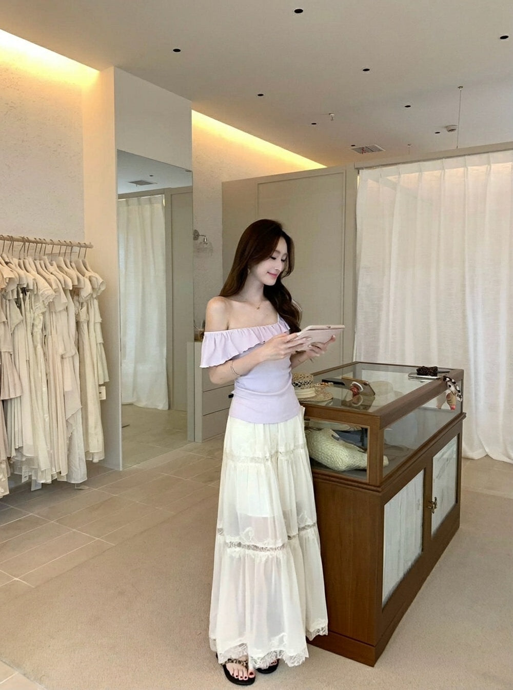 Model wearing white heavy lace spliced midi skirt