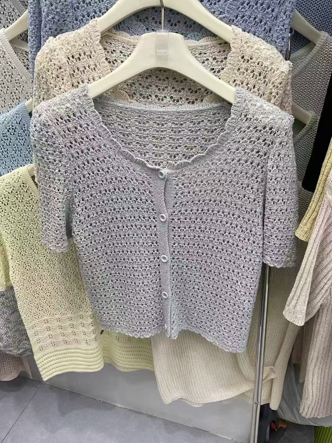 Light grey open-knit short-sleeve cardigan