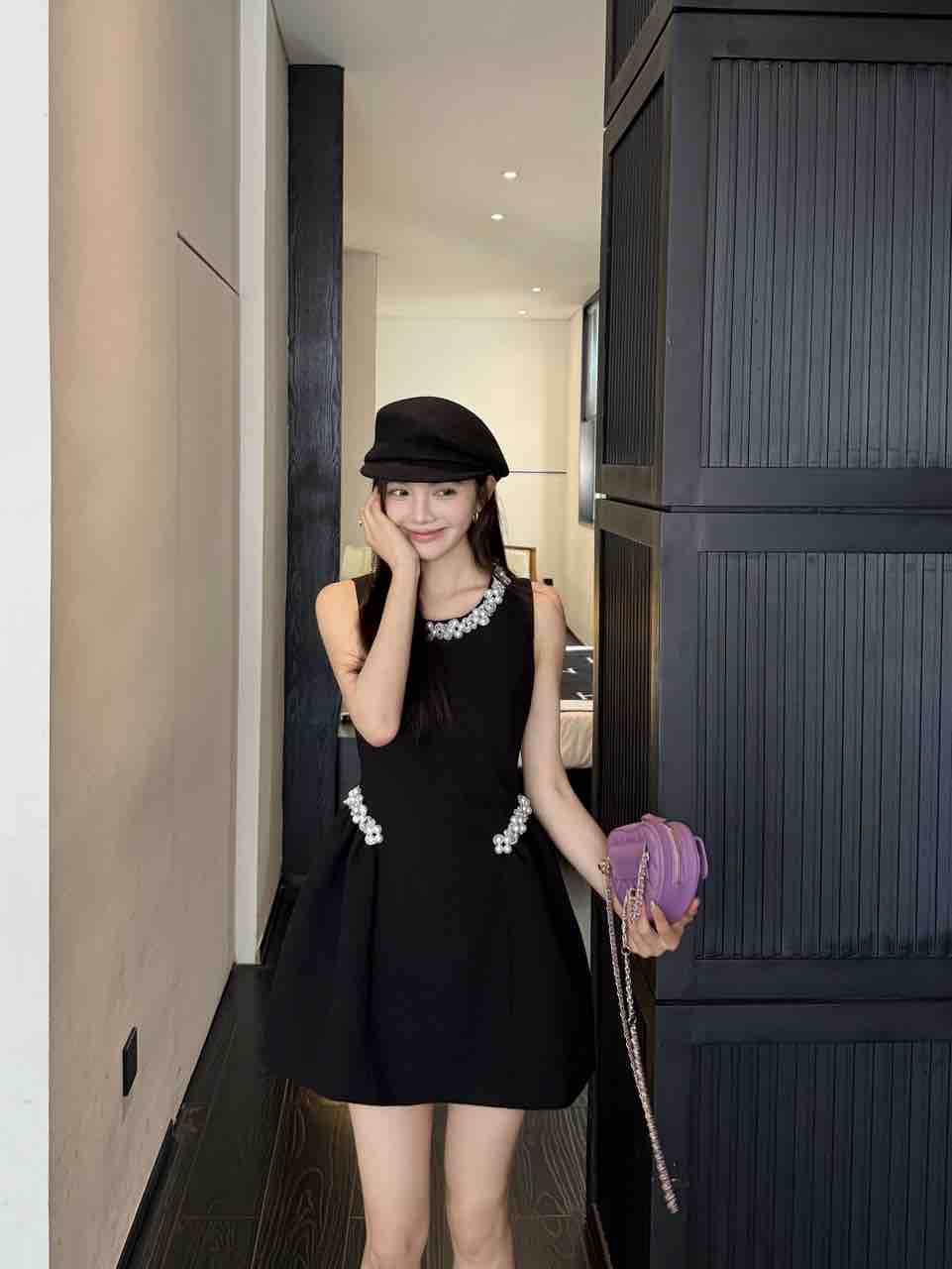 Elegant black pearl embellished dress