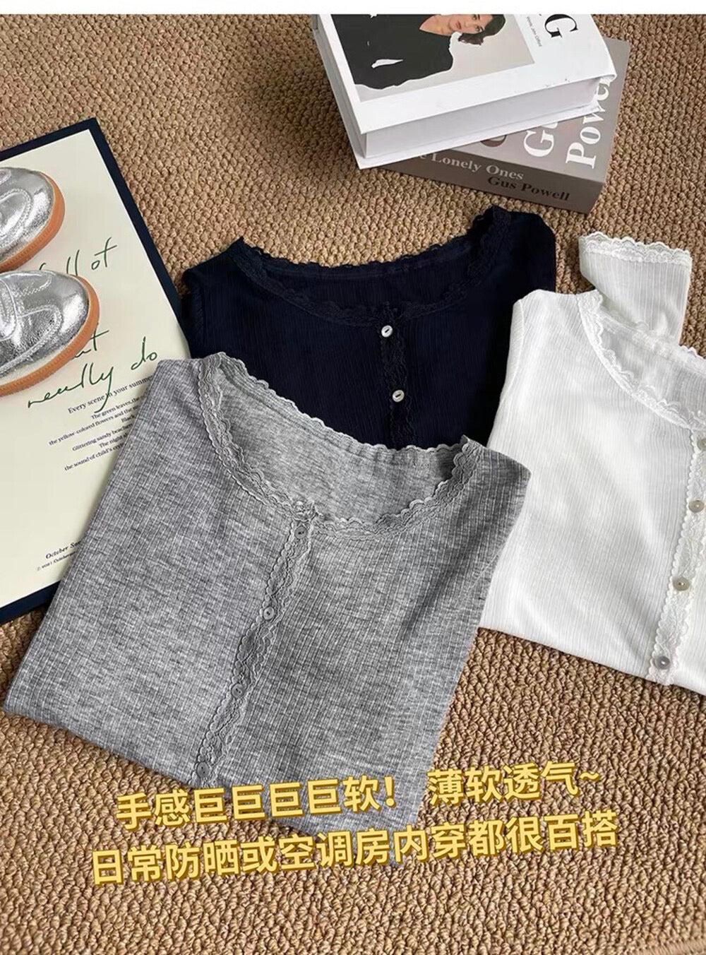 Flat lay of lace spliced soft sunscreen cardigans in grey, black, and white