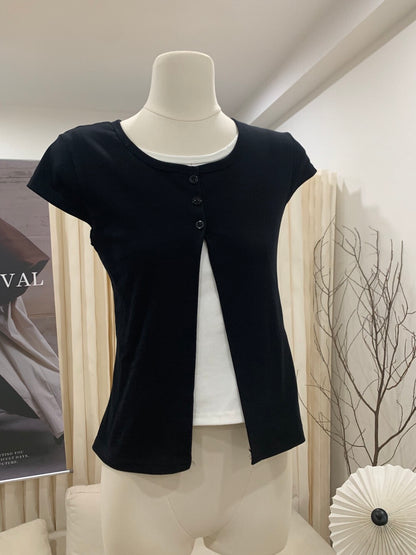 Black faux two-piece short sleeve shirt on a mannequin