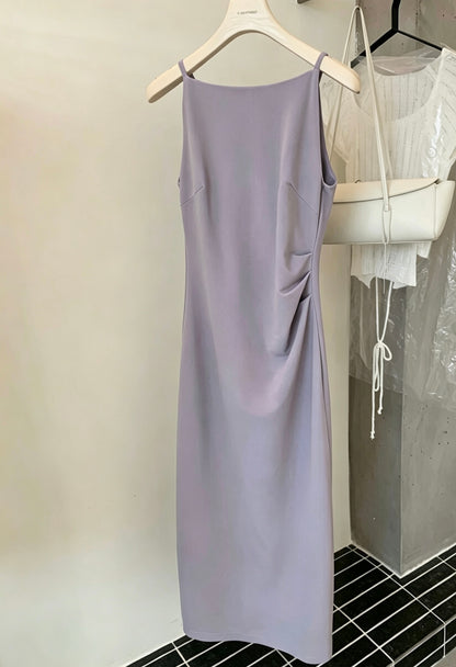 Light purple sleeveless dress hanging on a hanger