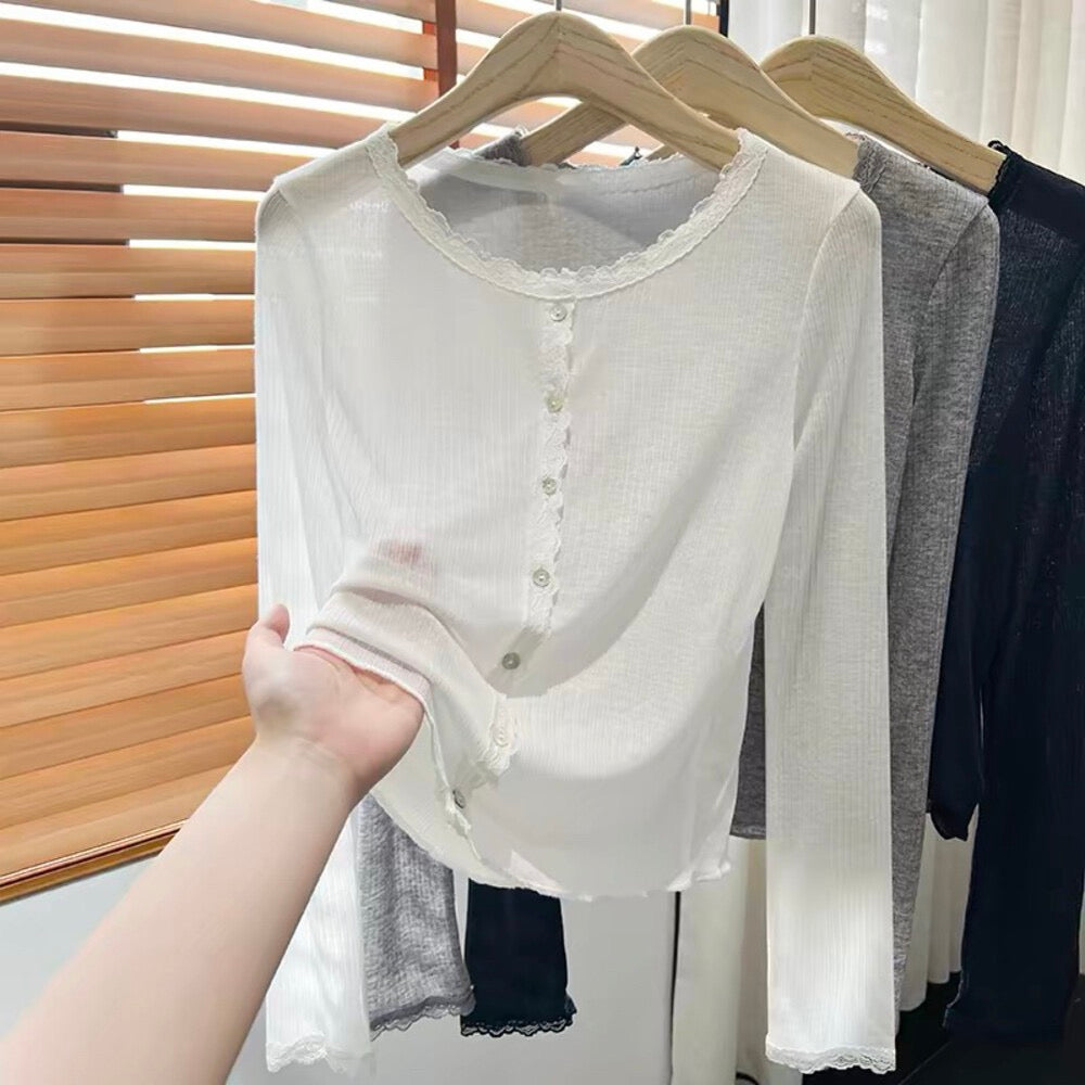 White lace spliced soft sunscreen cardigan on hanger