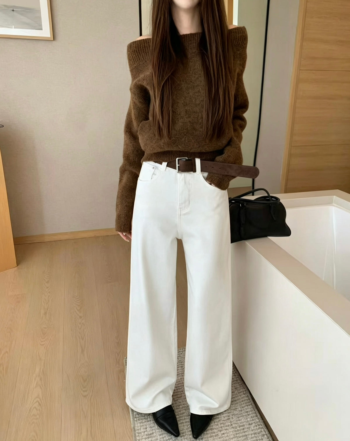 Model wearing white straight jeans
