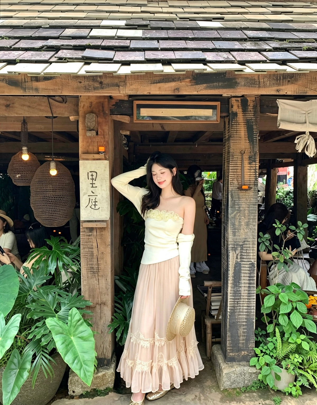Woman standing wearing peach lace trim tulle skirt