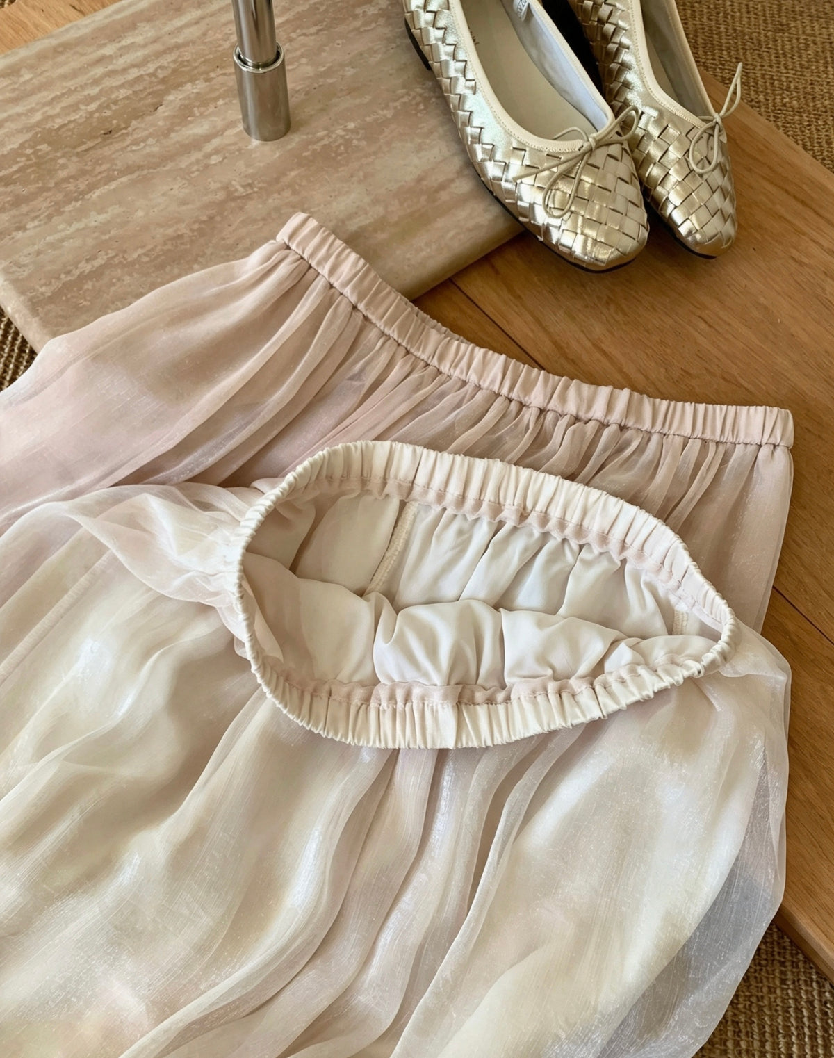 Flat lay of peach tulle skirt showing elastic waistband