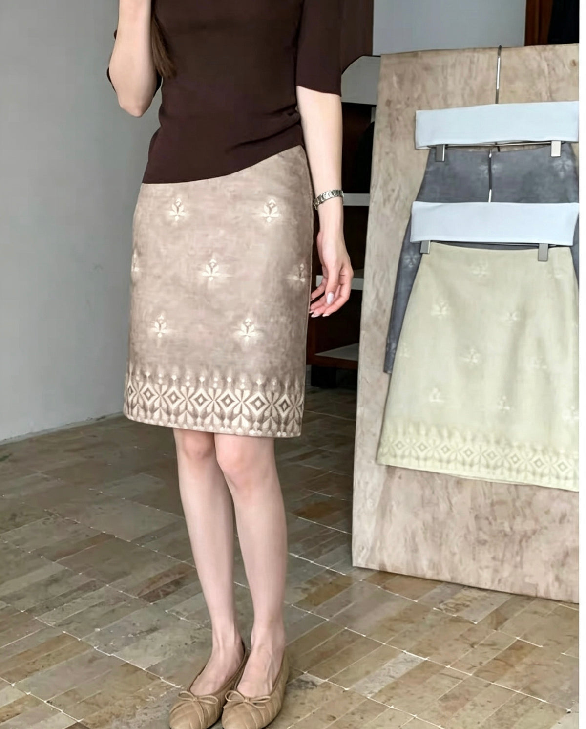 Model wearing the embroidered tie-dye vintage skirt in brown