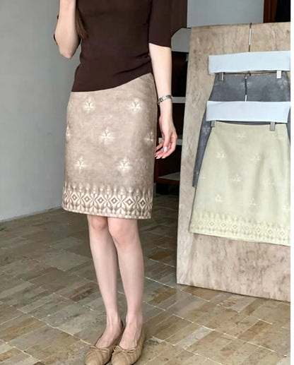 Model wearing the embroidered tie-dye vintage skirt in brown