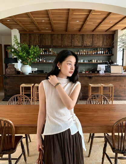 White textured sleeveless top with side tie