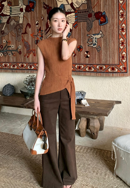 Model wearing coffee mock neck textured sleeveless top