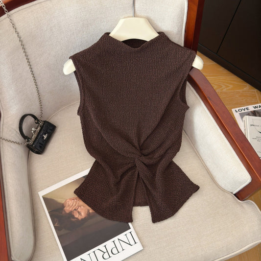 Front view of dark coffee brown mock neck sleeveless top with twist knot