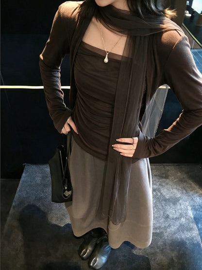 Model wearing brown mesh scarf top